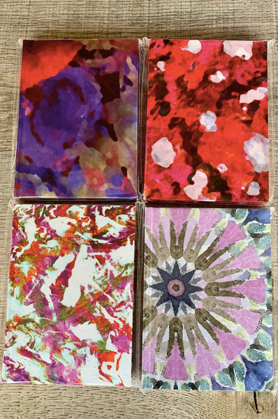 4 silk notebooks with assorted patterns 